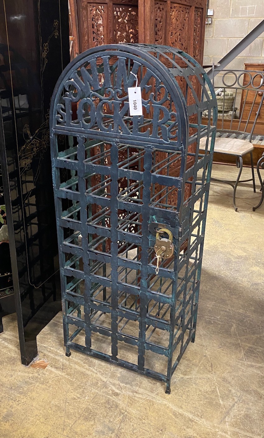 A painted wrought iron 32 bottle wine locker with padlock, width 43cm, height 112cm